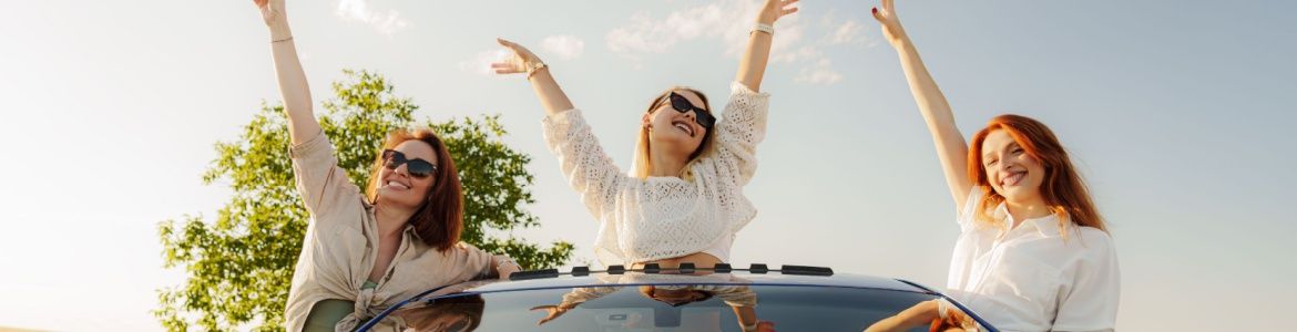 happy girls in a car
